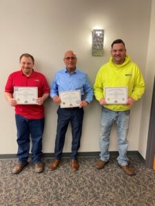 Joe Parise, Craig Kunz, and Alexander Farina received their certificates and badges from the United Brotherhood of Carpenters (UBC) for participating in education and training in infection control risk assessment (ICRA). 